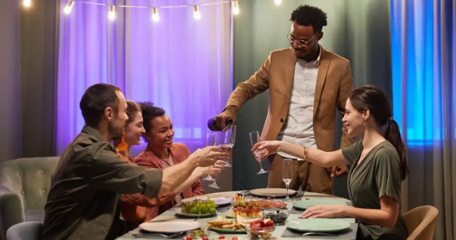 Gifting etiquette People having a dinner together