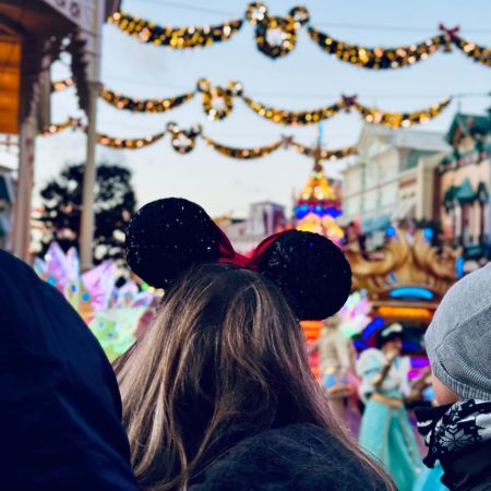 Florida gifts An image of people at Disneyworld with someone wearing Mickey Ears