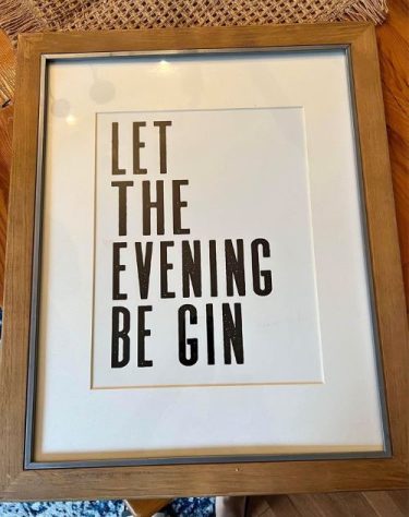 gin-themed gifts A framed poset with the text "let the evening be gin"