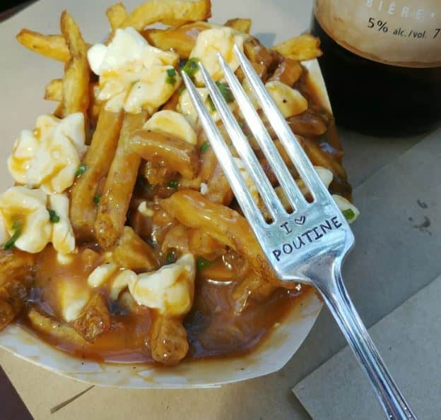 A fork with the text "I love poutine" etched