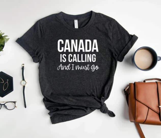 A funny black shirt with the text "Canada is calling and I must go"