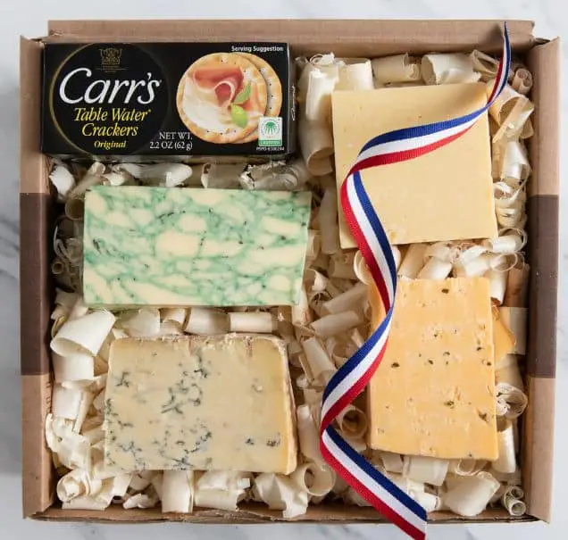 gifts for anglophiles A cheese gift basket with different cheeses from the UK
