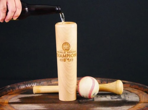 A wooden mug made from an old baseball bat
