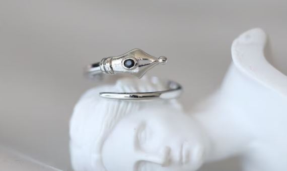 gifts for writers A ring in the shape of a pen