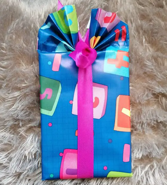 A gift with a pink ribbon