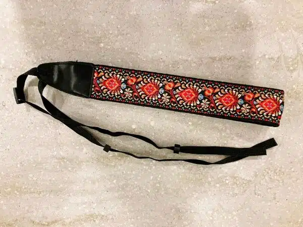 stocking stuffers for travelers An embroidered camera strap