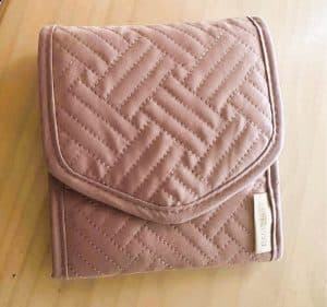 stocking stuffers for travelers A pink wallet shaped jewelry organizer for travelers