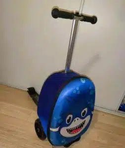 A suitcase with a scooter