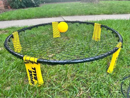 travel gifts for teenagers A net with a ball on the grass