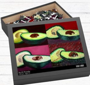A box of a jigsaw puzzle of avocados