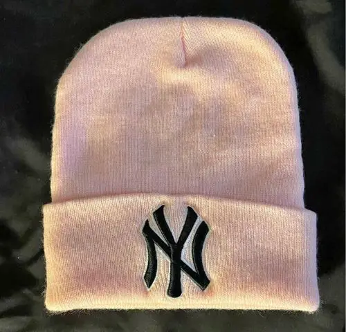 A pink beanie of the New York Yankees