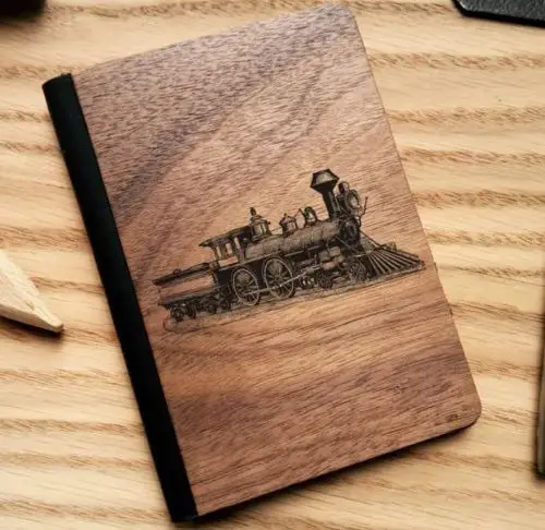 gifts for train lovers A wooden passport cover with an image of a train