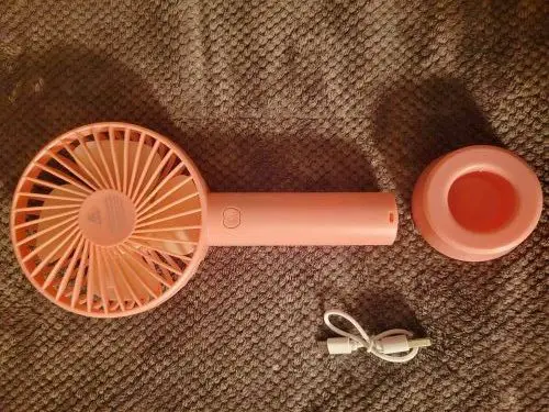 funny travel gifts A small handheld fan