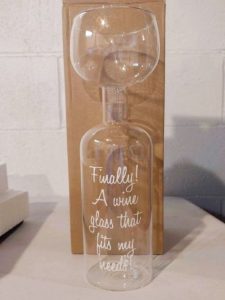 funny travel gifts A wine glass that fits and entire wine bottle