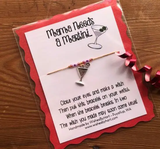 A small wish bracelet with a martini glass pendant