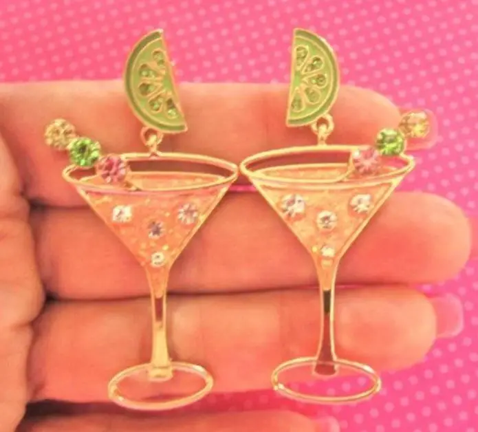 two earring studs in the shape of martini glasses