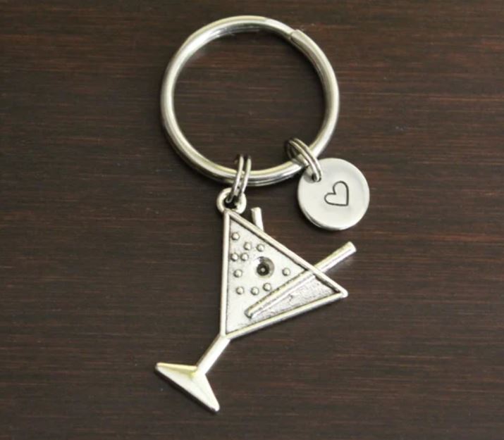 A keychian with a pendant of a martini glass