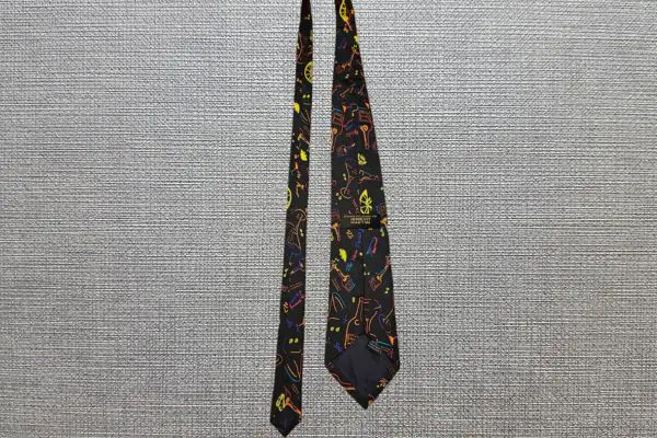 A black necktie decorated with martini glasses
