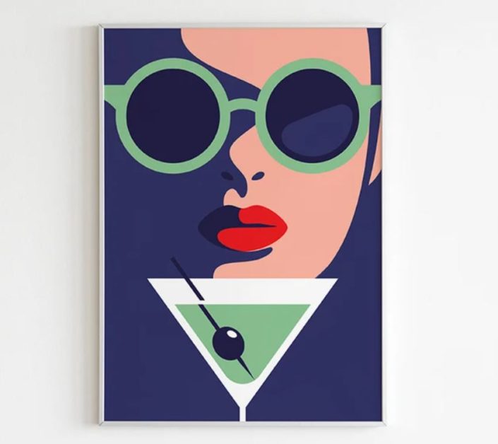 A poster of a face with a martini glass