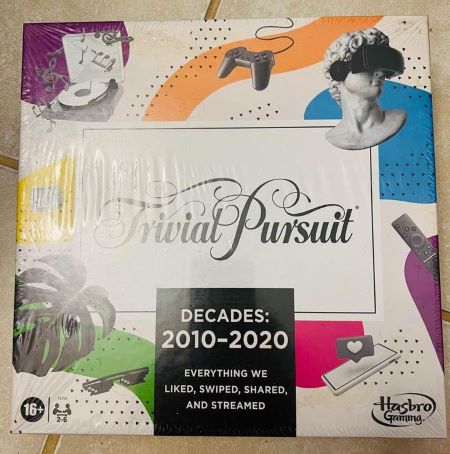gifts for trivia lovers A box of Trivial Persuit game from the decades 2010-2020