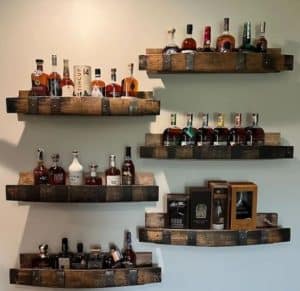 Six shelves made from old whiskey barrels