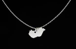A silver necklace with a pendant of the map of Hungary