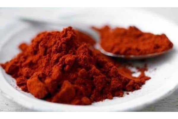 A plate wih red paprika spices