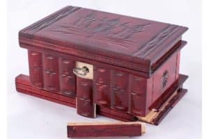 A wooden box with a key