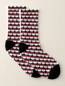 A pair of socks with hearts in the color of the flag of Hungary
