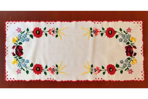 A white embroidered table runner from Hungary