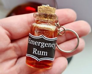 rum gifts A keychian with a miniature bottle and the text "emergency rum"