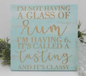rum gifts A wooden sign with "I'm not having a glass of rum, I'm having 6 and it's called a tasting and it's classy"