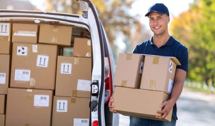 A delivery man with boxes