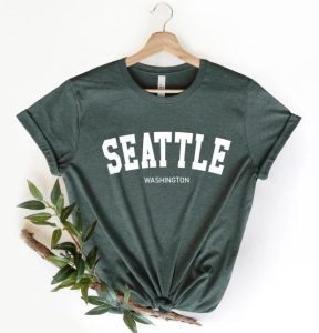 Seattle gifts A green t-shirt with the words "Seattle, Washington"