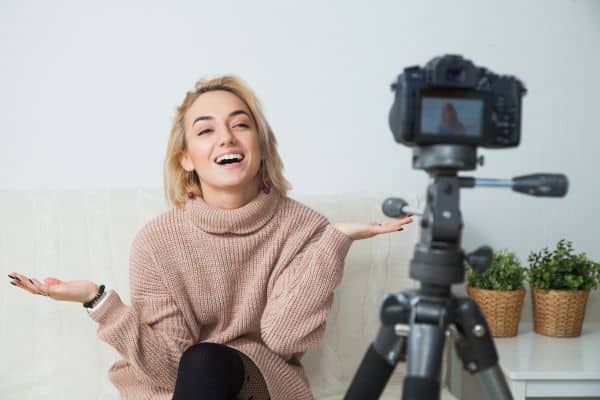 A woman in front of a camera